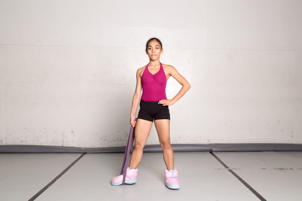 To give yourself a bit more of a challenge, try doing these side stretches with weights
