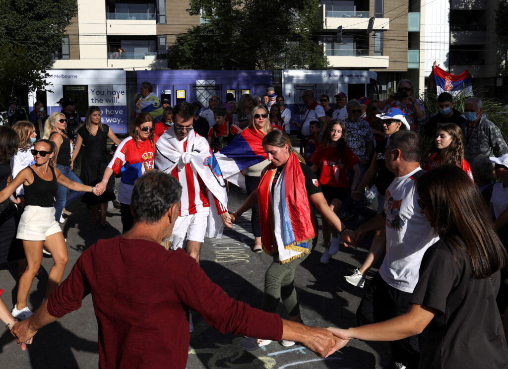 More supporters of Novak Djokovic rally outside the Park Hotel