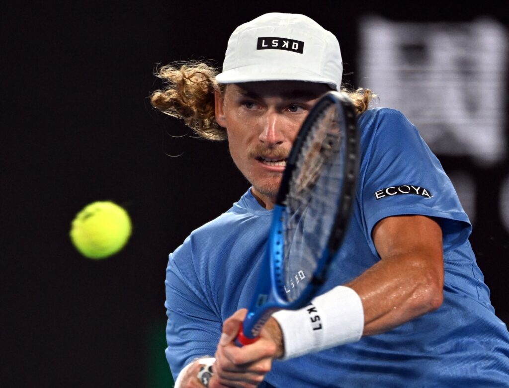 Australia's Max Purcell in action during his second round match against Norway's Casper Ruud | Photo by Tracey Nearmy/Reuters
